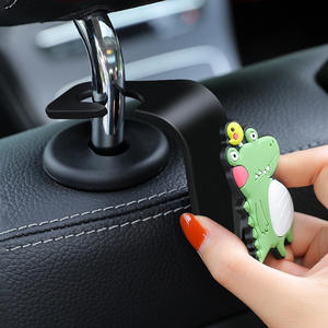 Gancho para asiento de coche Yiju, diseño de dinosaurio de dibujos animados, material ABS, gancho antideslizante para almacenamiento en el interior del coche, uso en el respaldo del asiento trasero. - Product Image 1