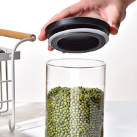 Vente en gros de bocaux de stockage en verre à haute teneur en borosilicate Taille personnalisée 450ml 700ml 1100ml Pot en verre de miel Couvercle en silicone pour le stockage des aliments