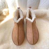 Nouvelles bottes de neige unisexes à tige courte pour l'automne/hiver, dessus en cuir de vache, doublure en fourrure artificielle, semelle épaisse antidérapante en tendon