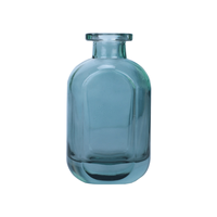 Vente en gros pot d'aromathérapie en rotin de luxe bouteille conteneur parfums liquides parfum de maison vide bâtonnets de roseau diffuseur bouteille en verre