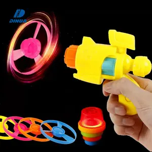 Pistola giratoria 2 en 1 para niños, platillo volador con luz Led intermitente y giroscopio giratorio