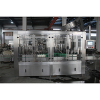 Machine de remplissage de boissons entièrement automatique industrielle 6000BPH, équipement d'embouteillage de jus en bouteilles de verre SUS304 CE