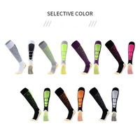 Chaussettes longues en Spandex/Nylon/Coton, nouveau design tendance, avec logo personnalisé, motif tricoté à lettres, pour le football et le sport, avec grip, collection printemps