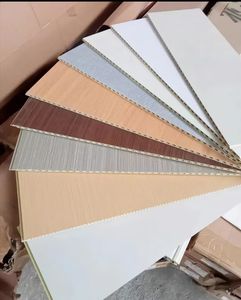 Vente chaude usine – Panneau mural SPC WPC de haute qualité en fibre de charbon, étanche, avec placage bois, pour décoration intérieure - Product Image 1