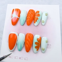 Vente en gros Orange Longueur moyenne Tendance Rafraîchissant Vent Dessiné à la main Faux ongles