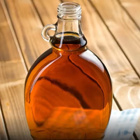 Envasado de alimentos 8oz 16oz Botella de vidrio de jarabe de arce con mango de oreja