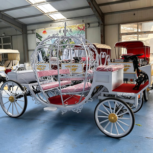 รถม้าไฟฟ้าสำหรับงานแต่งงานทรงฟักทองสีขาวสไตล์ซินเดอเรลล่า ภายในสีแดงตกแต่งขอบสีทอง - Product Image 1
