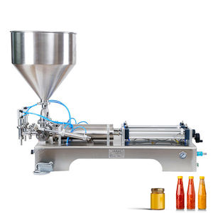 Máquina neumática de llenado de pasta de doble cabezal para miel, mermelada, crema, champú, salsa de tomate, salsa, loción, mantequilla de cacahuete, mayonesa, detergente - Product Image 1