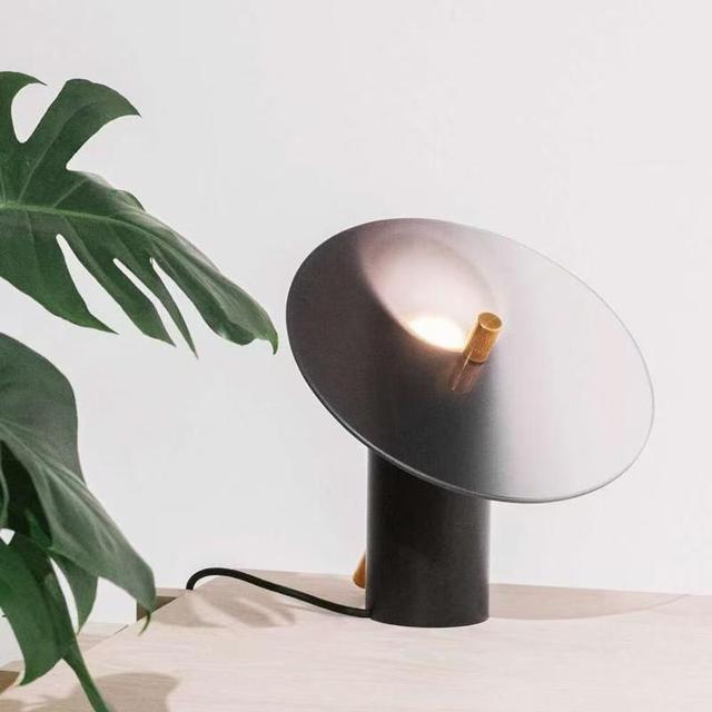 High-End Decorative Table Lamp with Nordic Minimalist Design. Features Iron Frame and Glass for a Post-Modern Bedroom Ambiance.
