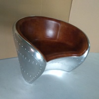 Fauteuil lounge rétro Spitfire en cuir et aluminium contemporain pour la maison, le salon, l'appartement, le bar, la salle à manger, l'hôtel, écologique