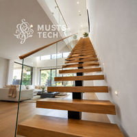 Escalier mono-à-capitère sur mesure, design architectural minimaliste intérieur, fabrication professionnelle et ingénierie