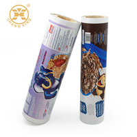 Stock de rouleaux de plastique de qualité alimentaire, sachet d'emballage, rouleau de film plastique transparent, adapté aux bonbons, aux noix et aux aliments