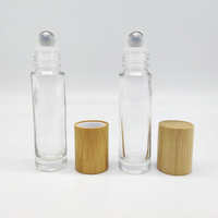 Flacon en verre à bille de 5 ml et 10 ml, transparent, ambré ou bleu, avec couvercle en bambou, pour huile essentielle, massage, huile corporelle
