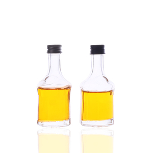 Venta al por mayor única forma redonda 50ml <span class=keywords><strong>Mini</strong></span> pequeña muestra <span class=keywords><strong>de</strong></span> jugo bebidas vidrio vino <span class=keywords><strong>licor</strong></span> <span class=keywords><strong>botellas</strong></span> con tapones <span class=keywords><strong>de</strong></span> rosca - Product Image 1