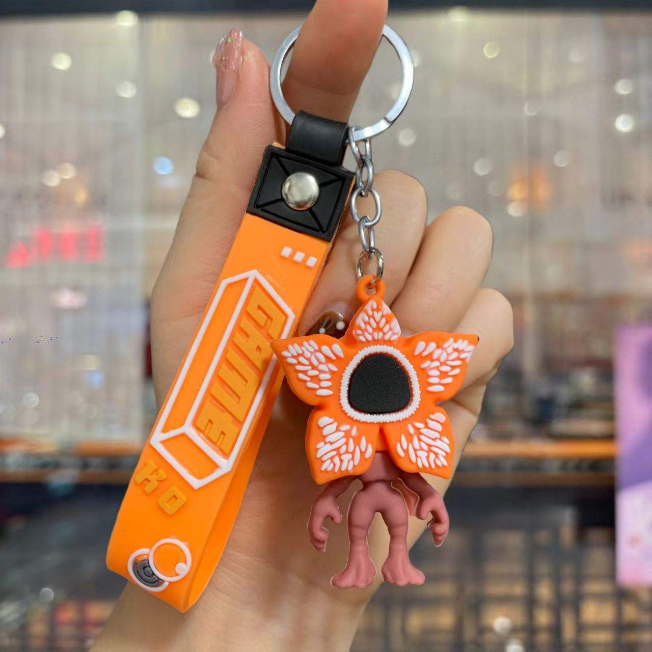 Colgante muñeca flor pastel-naranja