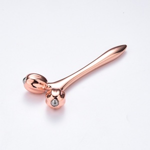 Instrumento de Masaje Adelgazante de Metal Color Oro Rosa de Lujo, Forma Libre, Venta al Por Mayor - Product Image 3