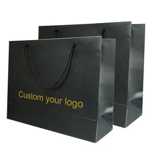 Custom Logo stampato di lusso imballaggio del nastro per lo Shopping manici Tote bag nero opaco sacchetto di carta per prodotti al dettaglio