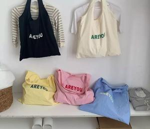 Sac de courses réutilisable pliable en polyester avec logo personnalisé, idéal pour les voyages, avec poignée et bandoulière, petite taille (20-30 cm), motif lettres - Product Image 2