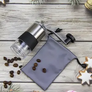Penggiling kopi tangan Mini portabel baja tahan karat dengan tas