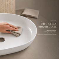 Vasque de salle de bain ovale en céramique 61*41cm, finition blanche brillante, à poser sur comptoir, à rebord fin, avec trou pour robinet unique