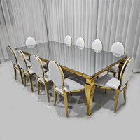 Ensemble de table à manger rectangulaire avec plateau en verre miroir et base en acier inoxydable doré