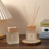 Bouteilles de diffuseur de parfum en verre rondes et carrées de luxe vides de 100 ml et 200 ml avec bouchon en bois