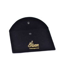 Sac de rangement pour bijoux en velours noir avec bouton pression et logo personnalisé estampé or