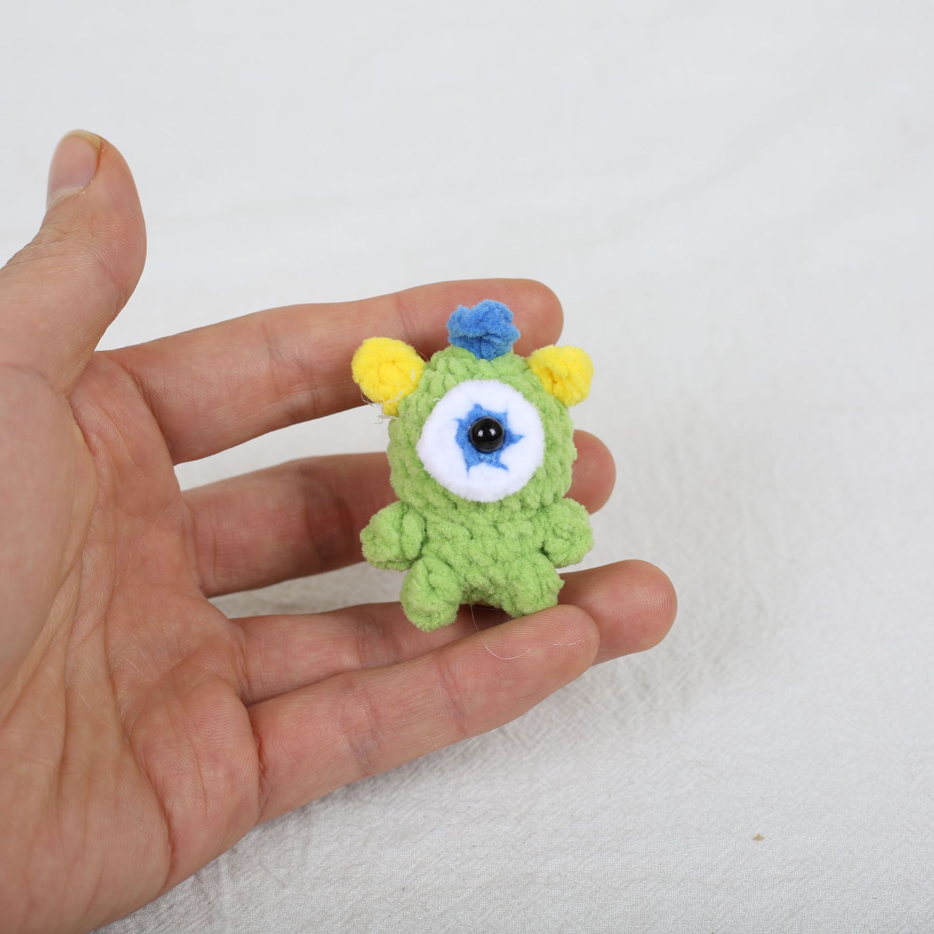 Créature verte borgne