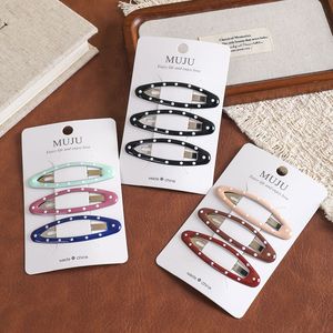 MUJU D411 Lot de 3 pinces à <span class=keywords><strong>cheveux</strong></span> métalliques à pois, ovales, émaillées, 6,5 cm, avec logo personnalisé, carte code-barres, prêtes à la vente au détail, pour enfants, faible MOQ - Product Image 1