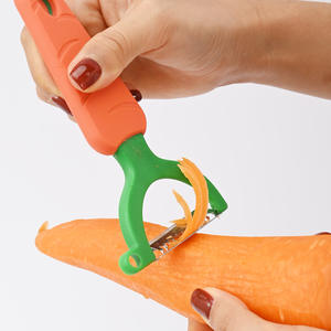 Éplucheur de légumes multifonction Zyc60 avec poignée en caoutchouc souple pour une utilisation en cuisine - Product Image 1