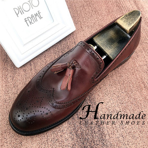 Nouvelles chaussures en cuir à motifs brocart de style britannique - Mocassins à franges en cuir véritable pour hommes - Chaussures en cuir ajustées haut de gamme - Product Image 1