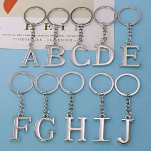 Venta al por mayor de fábrica, se pueden personalizar 26 letras inglesas, accesorios que no se desvanecen, colgante de llavero hueco de acero inoxidable - Product Image 1