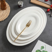 Design moderne Grande assiette ovale en céramique Blanc pur Vaisselle de restaurant Fournitures d'hôtel écologiques pour quantité minimale de commande de poisson à la vapeur 20pcs