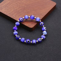 Nouveautés Bracelet en perles œil de diable en acrylique Bijoux unisexe Bracelet ajustable en résine colorée avec perles œil maléfique pour fille