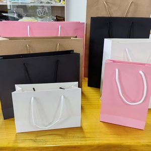 <span class=keywords><strong>Sac</strong></span> en papier kraft cadeau épais pour l'emballage de vêtements <span class=keywords><strong>Sac</strong></span> à provisions pour femmes Sacs à vêtements en papier kraft blanc - Product Image 4