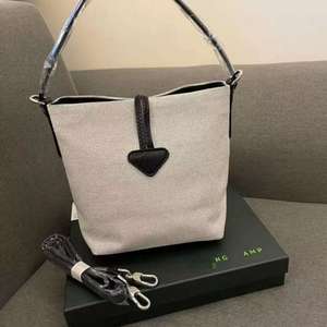 2026 Frankrijk Merk Lange-rits Groothandel Handtas Grote Capaciteit Canvas Emmersak Dumpling Commuter Schoudertas voor Dames - Product Image 4