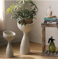Grand pot à plantes en ciment effet marbre de forme elliptique respirant avec plateau pour la décoration du sol de la maison et du jardin