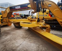 Niveleuse sur pneus Caterpillar CAT 140H d'occasion, 138 kW, d'origine japonaise, longueur de lame 3660 mm, 15 tonnes, équipement de construction routière