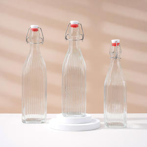 Bouteille en verre carrée transparente vide avec bouchon à bascule hermétique pour jus, eau et kombucha – Vente en gros - Product Image 3