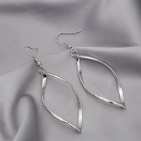 Boucles d'oreilles tendance en alliage super brillant, torsadées avec diamants, accessoires exagérés pour femmes
