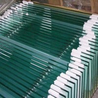 Grosir kaca Tempered 12mm kaca apung kekuatan tinggi untuk rumah sakit dan kamar mandi menggunakan merek Xinsheng produsen