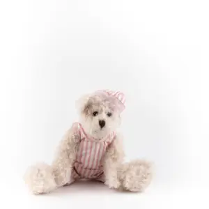 Cute in pajamas to accompany teddy bear to soothe sleep