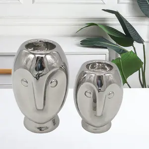Unique Design Silver Electroplated Ceramic T-Light Candle Holder for Home Hotel Decoration Face-Shaped Candle Stand Christmas