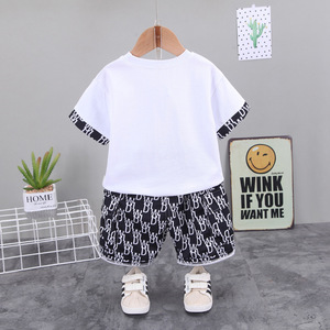 Vêtements de boutique pour enfants d'été, vêtements noirs et blancs pour garçons, ensembles de vêtements de nuit avec motif de dessin animé - Product Image 2