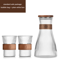 Carafe à eau en verre borosilicate de style vertical rétro avec couvercle