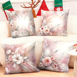 Almohadas decorativas con plumas florales rosas adornan la acogedora sala de estar con medias navideñas y astas de reno. - Product Image 1