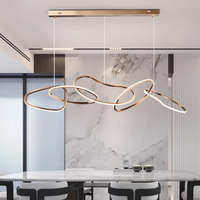 Lustre suspendu LED moderne et artistique, finition acier inoxydable minimaliste, hauteur réglable, doré, pour salon