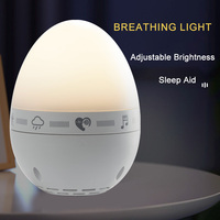 Machine de sommeil à bruit blanc d'oeuf Aide au sommeil portable Aide au sommeil Machine à son apaisant Berceuse Boîte à musique Machine à son ambiant