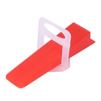 Les clips du système de nivellement des carreaux de 1/8 po comprennent des entretoises de nivellement des carreaux