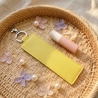 Porte-rouge à lèvres portable en cuir PU avec porte-clés, pochette de rangement pour baume à lèvres avec breloque perles colorées et dragonne, breloque de sac pour femme